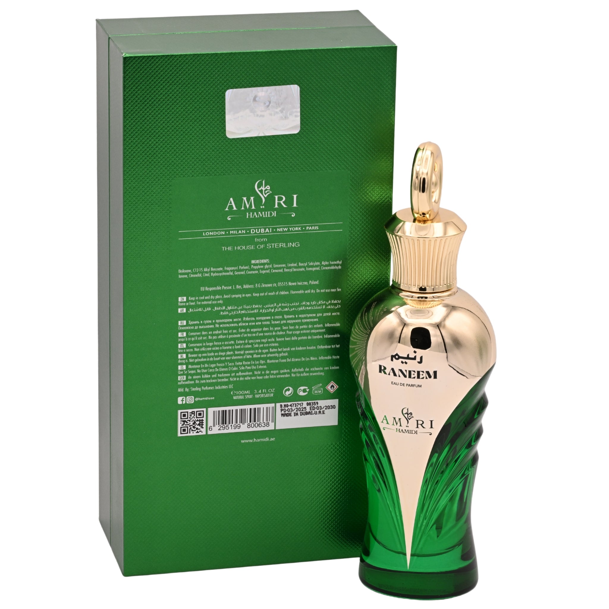 Green and gold perfume bottle with packaging on a white background