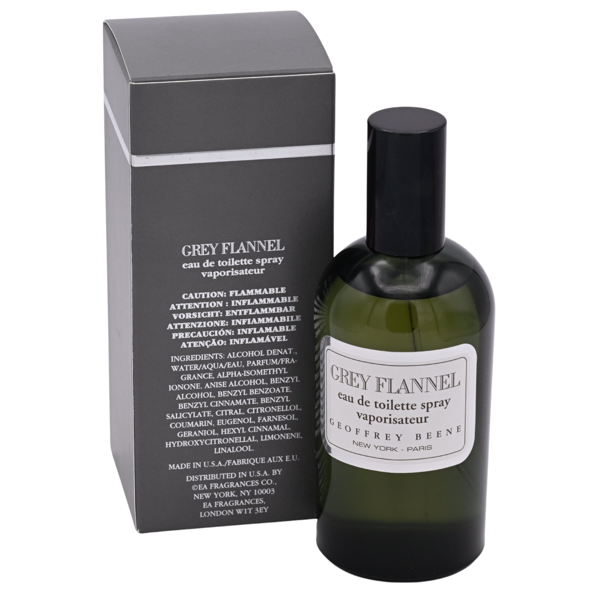 Green bottle of Grey Flannel eau de toilette spray by Geoffrey Beene with packaging on a white background
