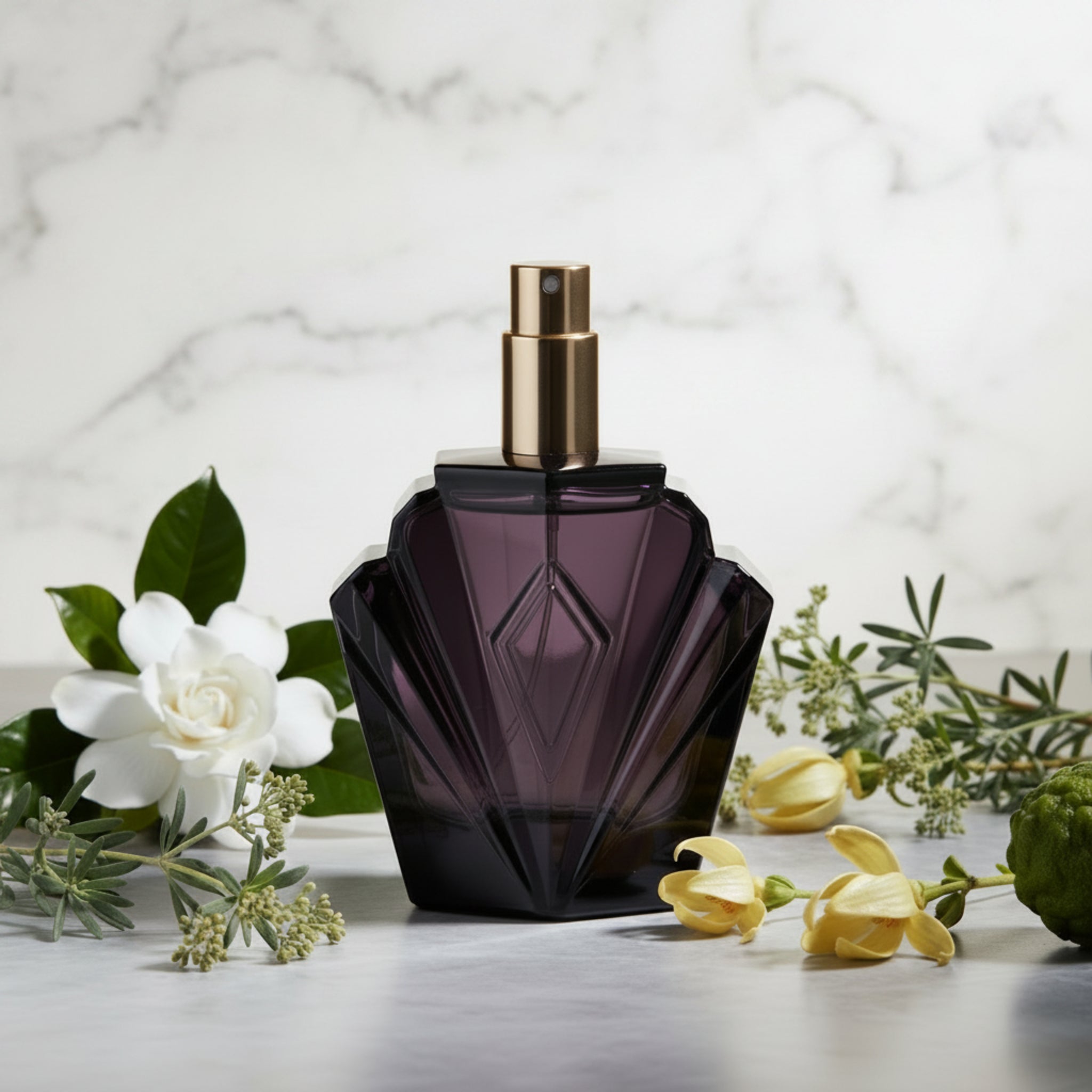 Black perfume bottle with a gold cap on a white background