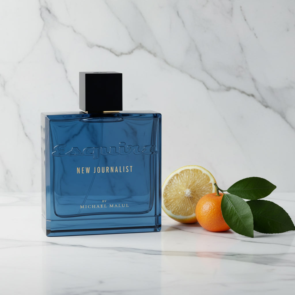 Blue perfume bottle with black cap on a white background