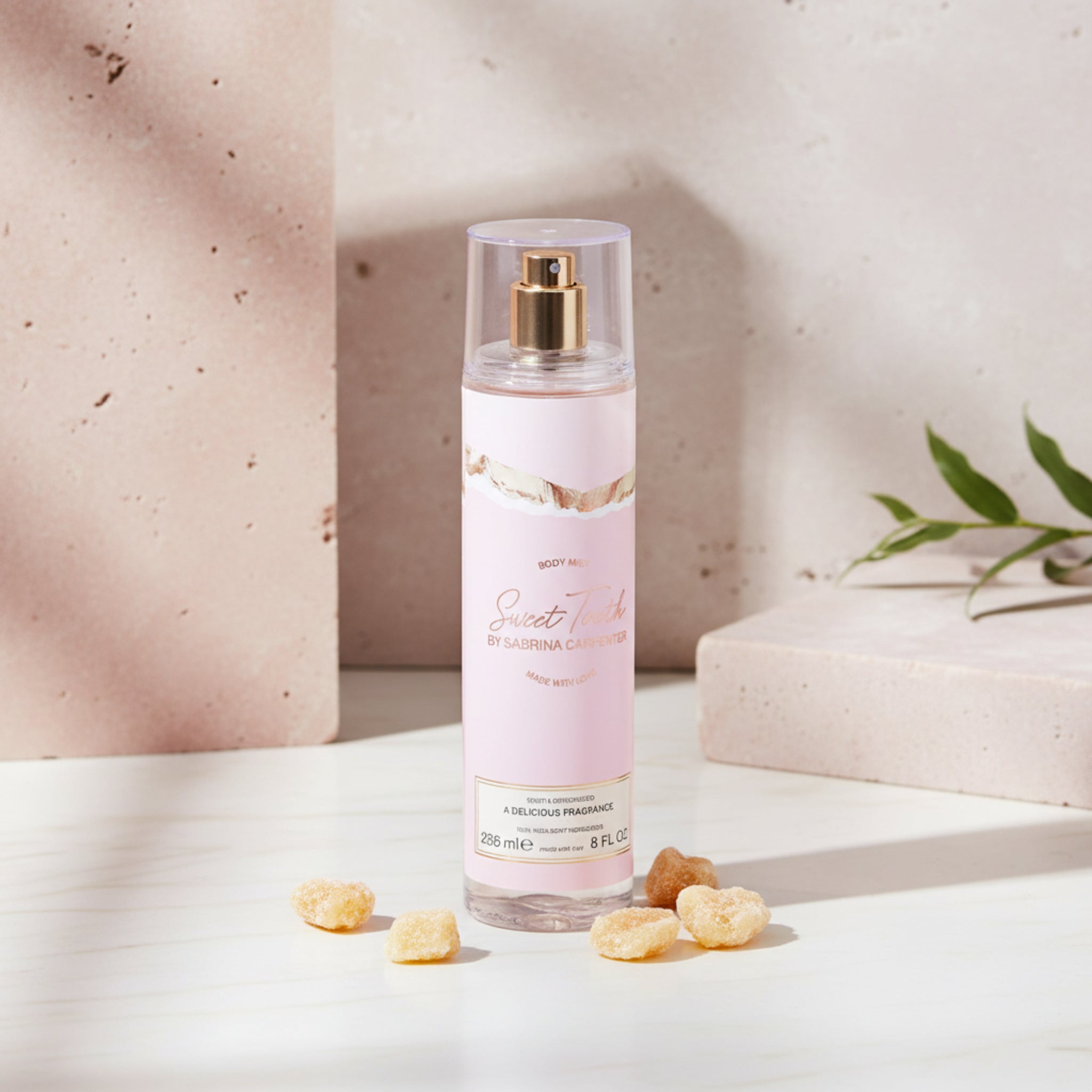 Perfume bottle with a pink label on a white background