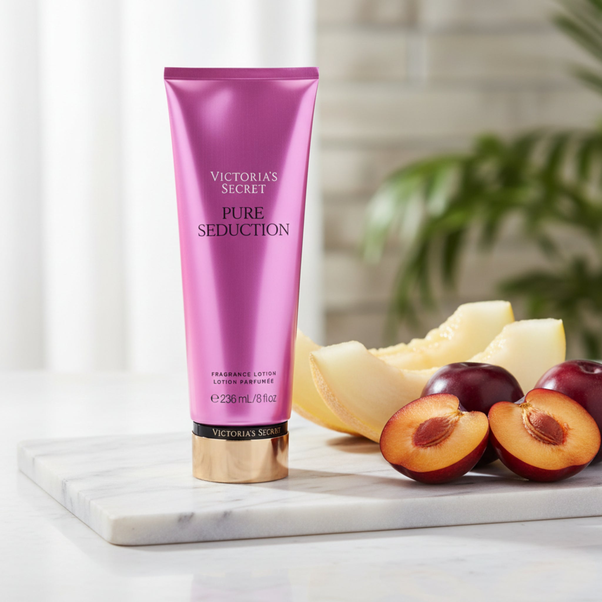 Victoria's Secret Pure Seduction fragrance lotion on a white background