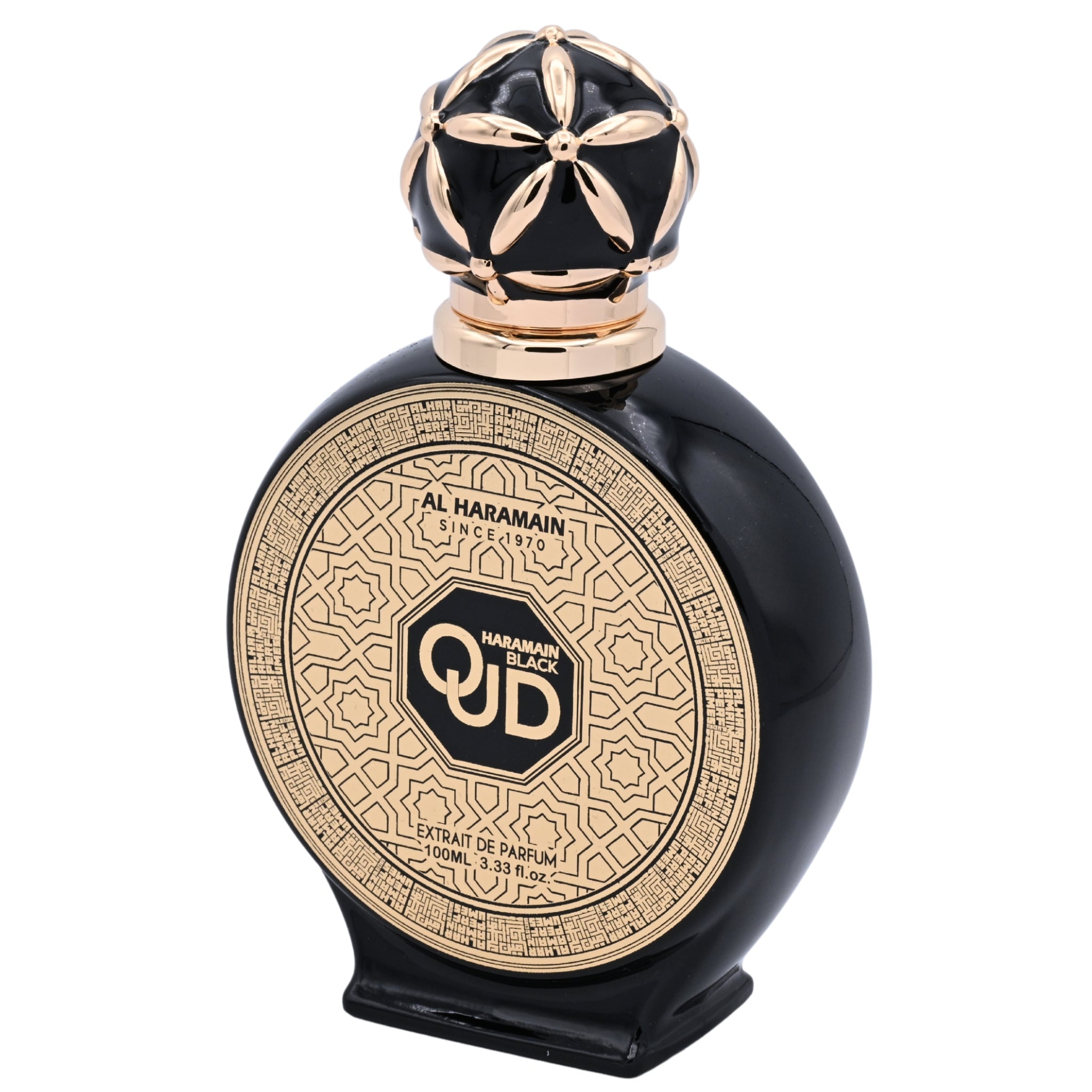 Black and gold perfume bottle with intricate design on a white background