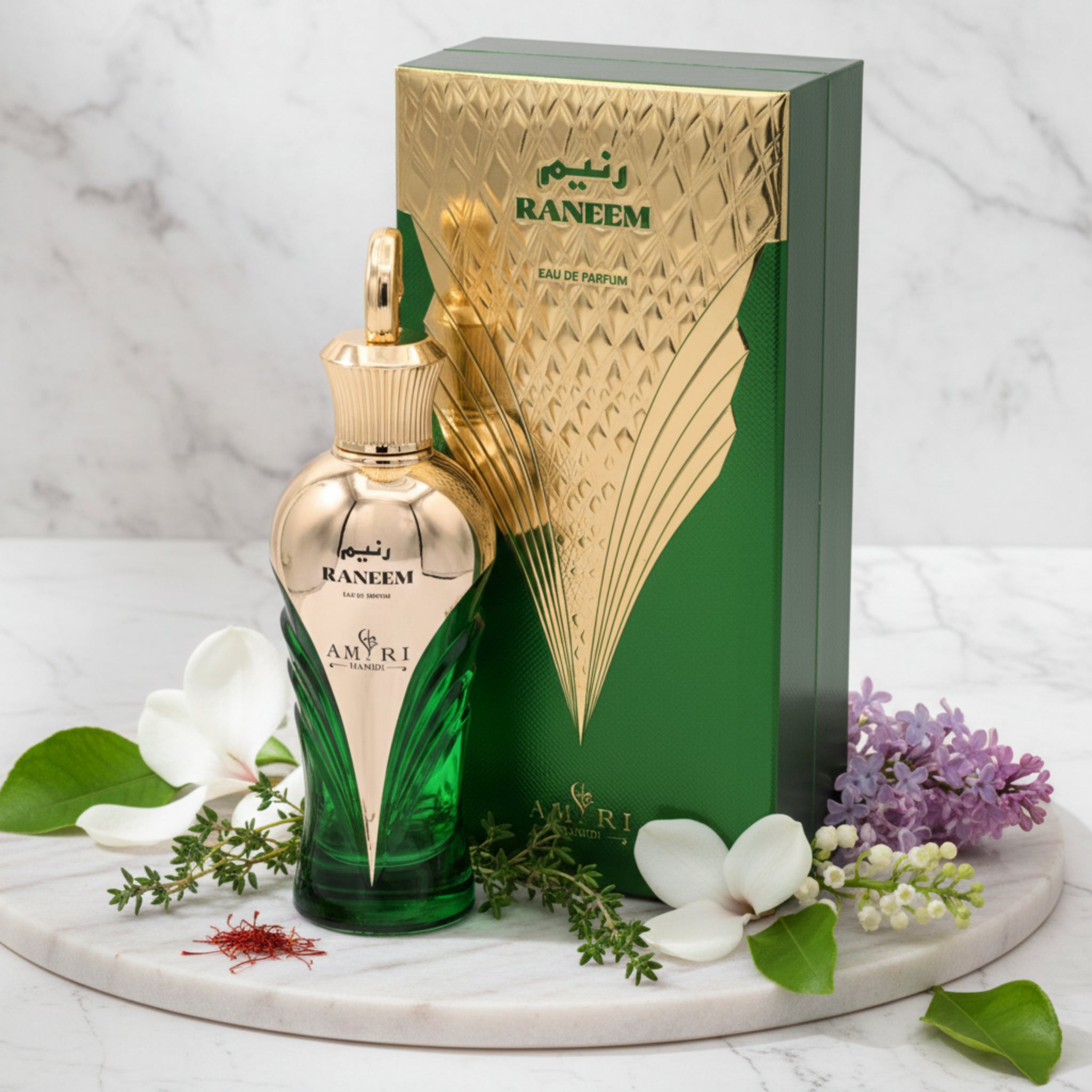 Green and gold Raneem perfume bottle with packaging on a white background