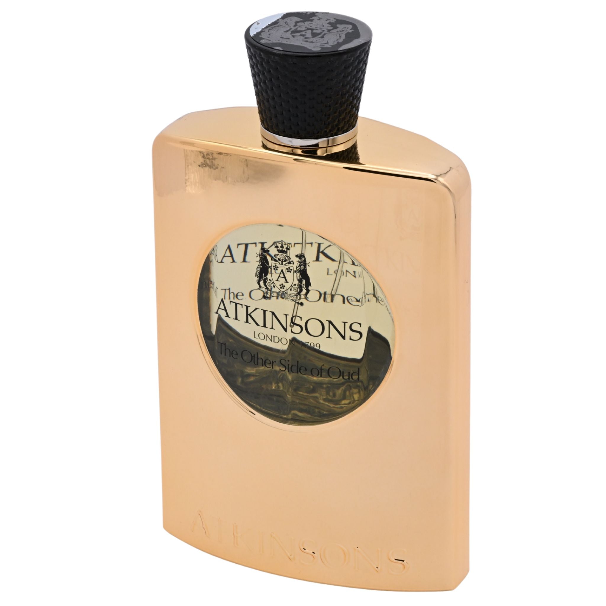 Gold perfume bottle with black cap and 'Atkinsons' label on a white background