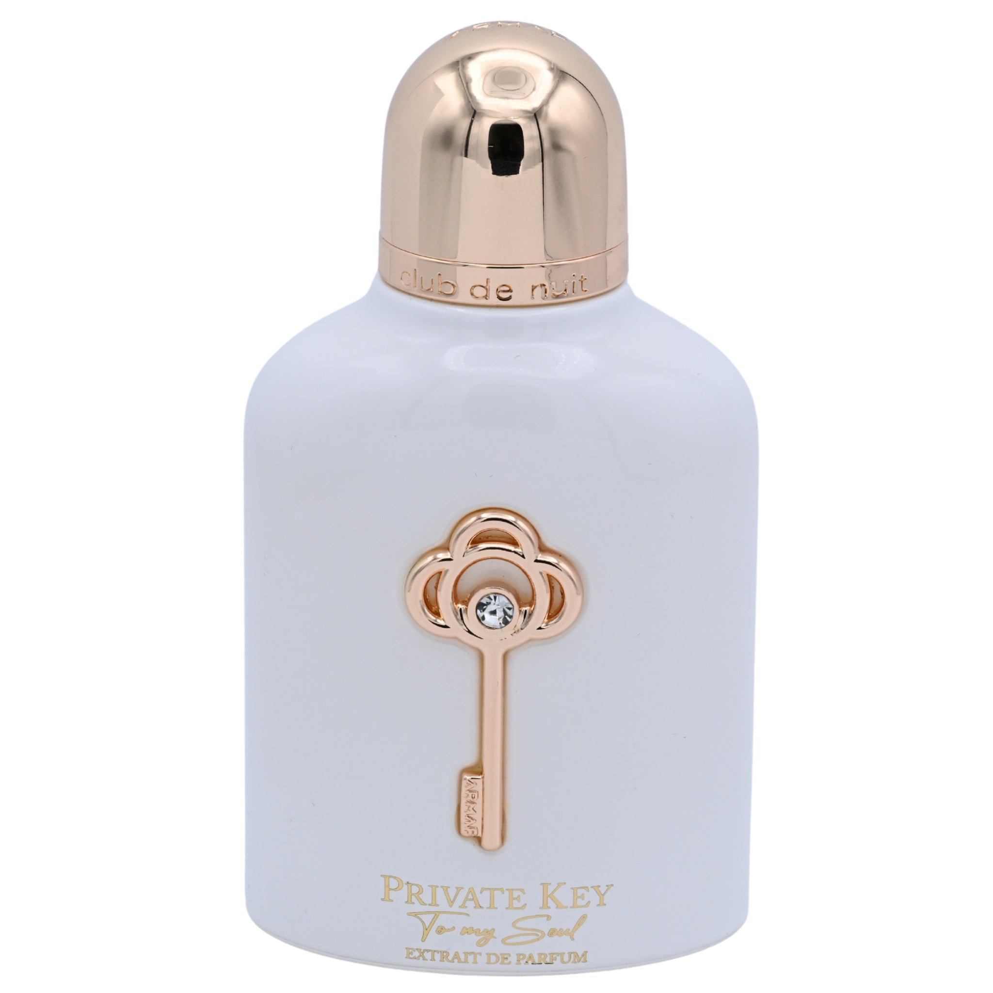 Perfume bottle with gold cap and key design on a white background