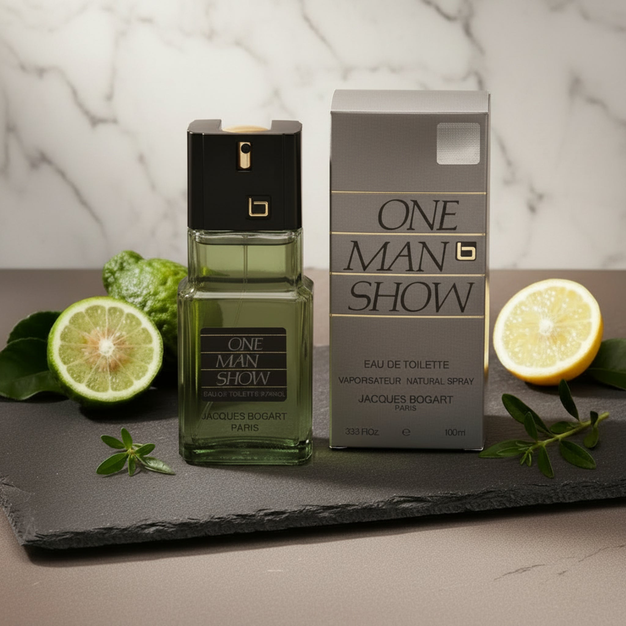 Perfume bottle and packaging of 'One Man Show' by Jacques Bogart on a white background