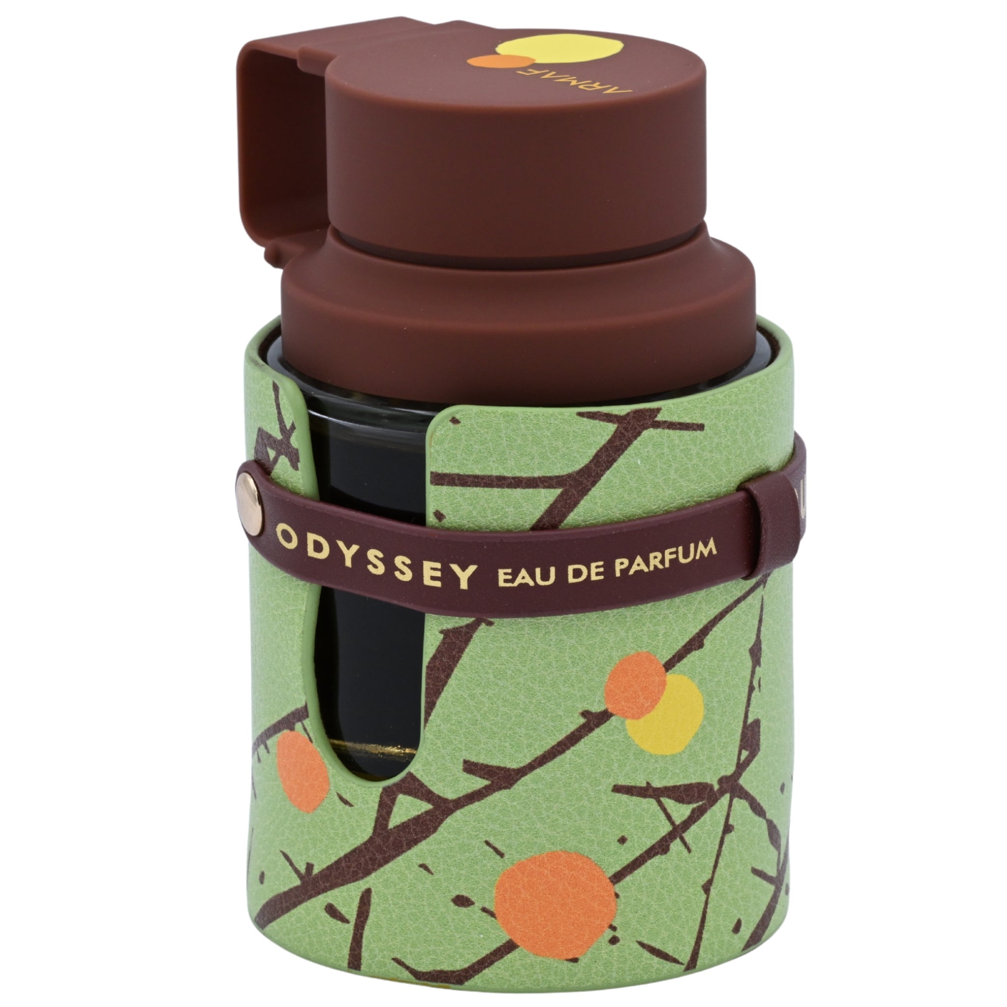 Odyssey eau de parfum bottle with green packaging featuring tree branches and fruits on a white background.
