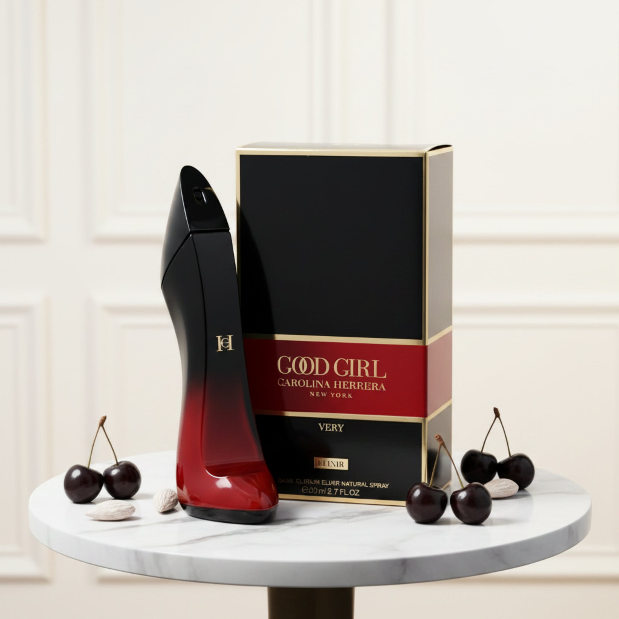 Red and black Carolina Herrera Good Girl perfume bottle with packaging on a white background