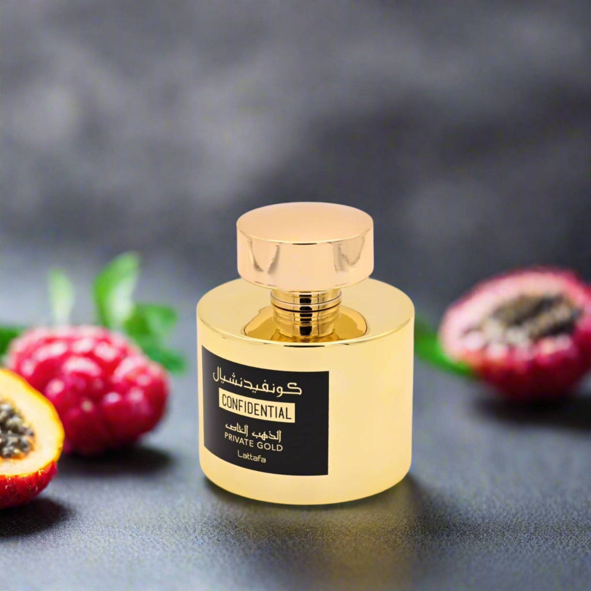 Gold perfume bottle labeled 'Confidential' with red fruits on a dark background