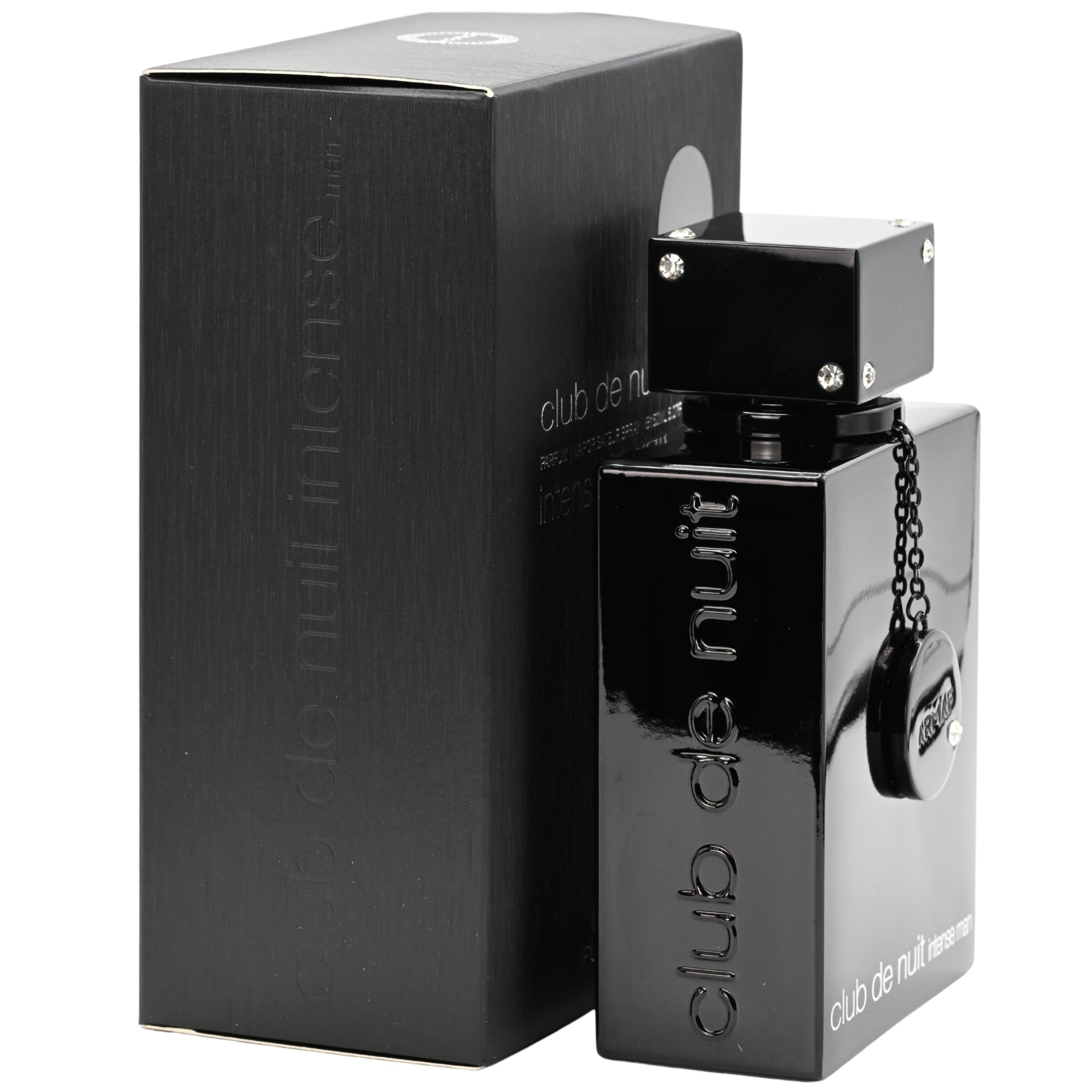 Black perfume bottle with 'club de nuit' branding next to its packaging on a white background