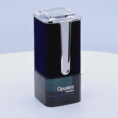 Al Haramain Opulent Sapphire perfume bottle rotating on a white podium