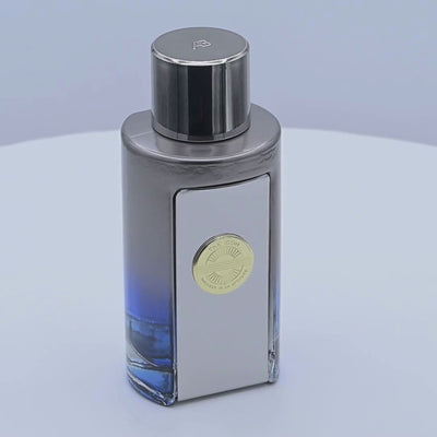 Banderas The Icon Elixir perfume bottle rotating on a white podium