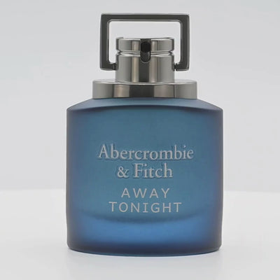 Abercrombie & Fitch Away Tonight  perfume bottle rotating on a white podium
