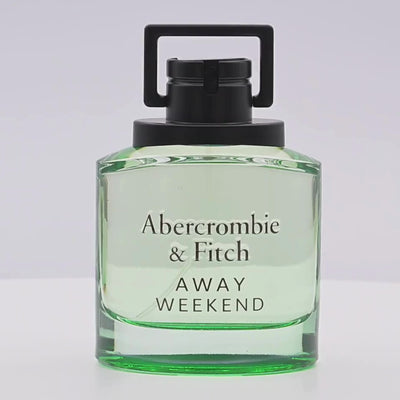 Abercrombie & Fitch perfume bottle rotating on a white podium
