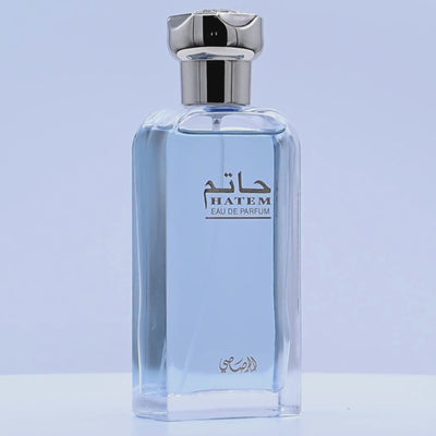 Hatem Eau de Parfum bottle rotating on a white podium