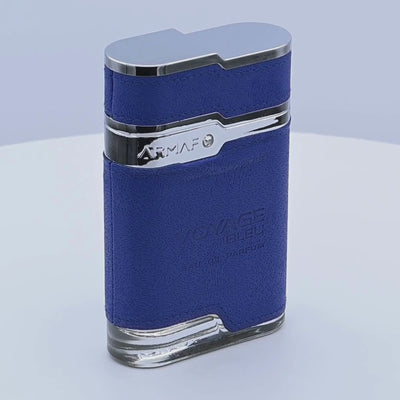 Blue Armaf perfume bottle rotating on a white podium