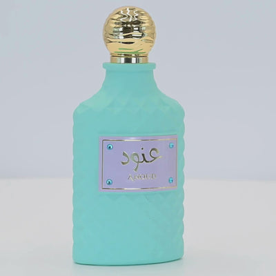 Anoud perfume bottle rotating on a white podium
