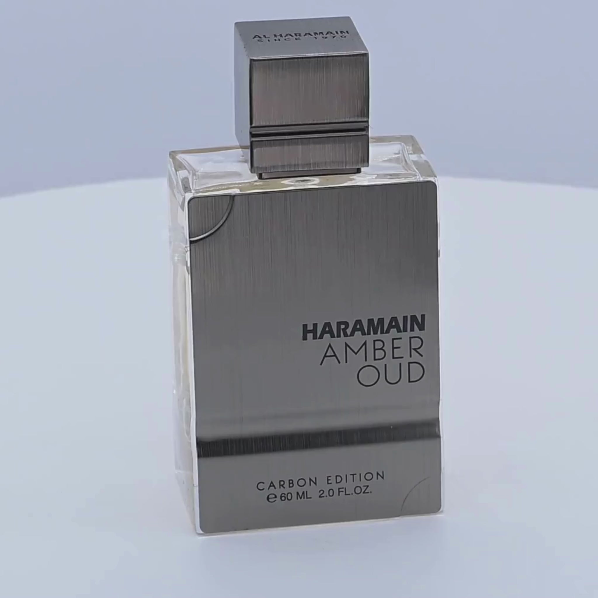 Haramain Amber Oud perfume bottle rotating on a white background