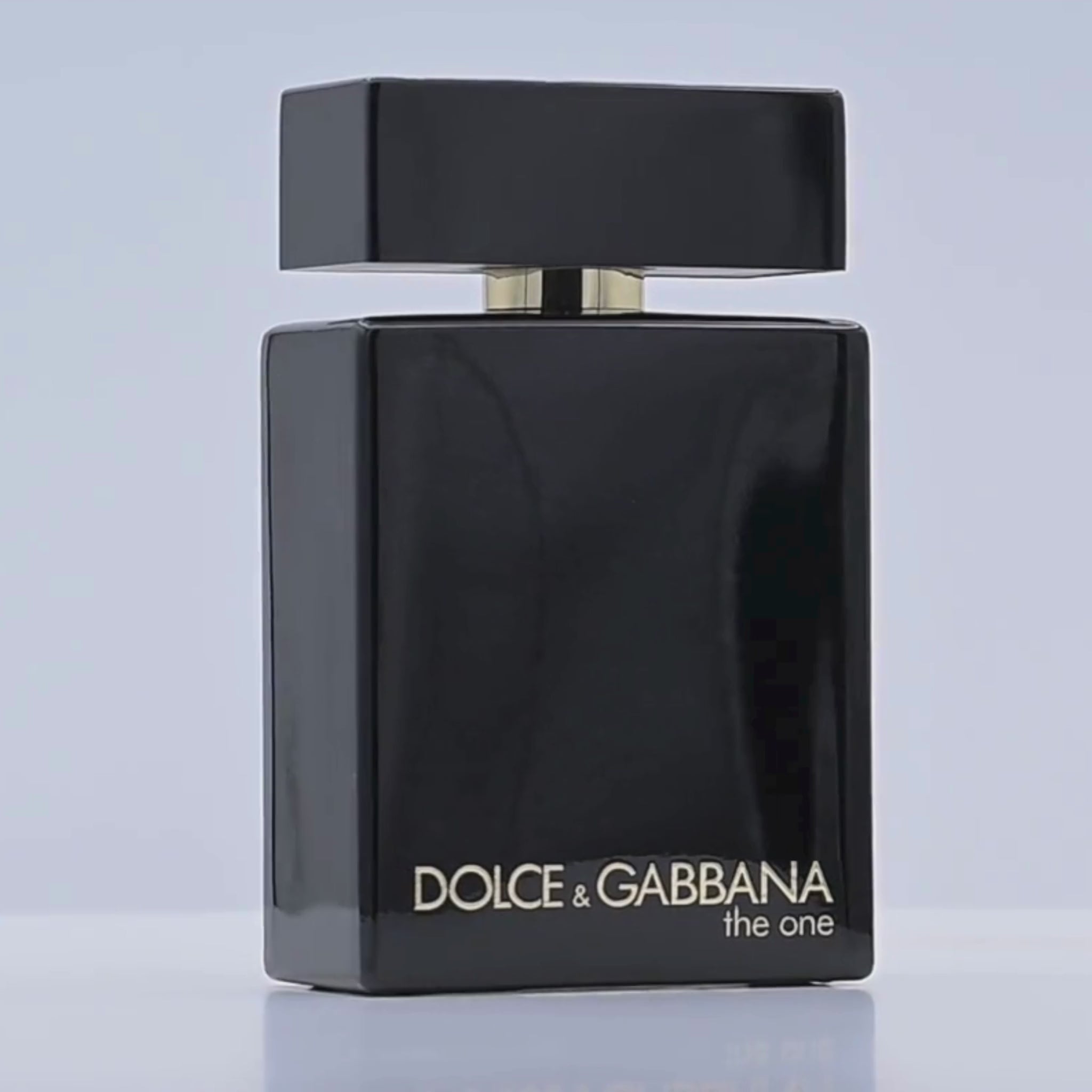 Dolce & Gabbana perfume bottle rotating on a white podium