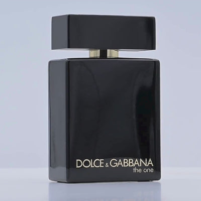 Dolce & Gabbana perfume bottle rotating on a white podium
