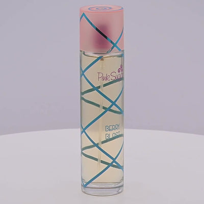 Perfume bottle labeled 'Pink Sugar Berry Blast' rotating on a white podium