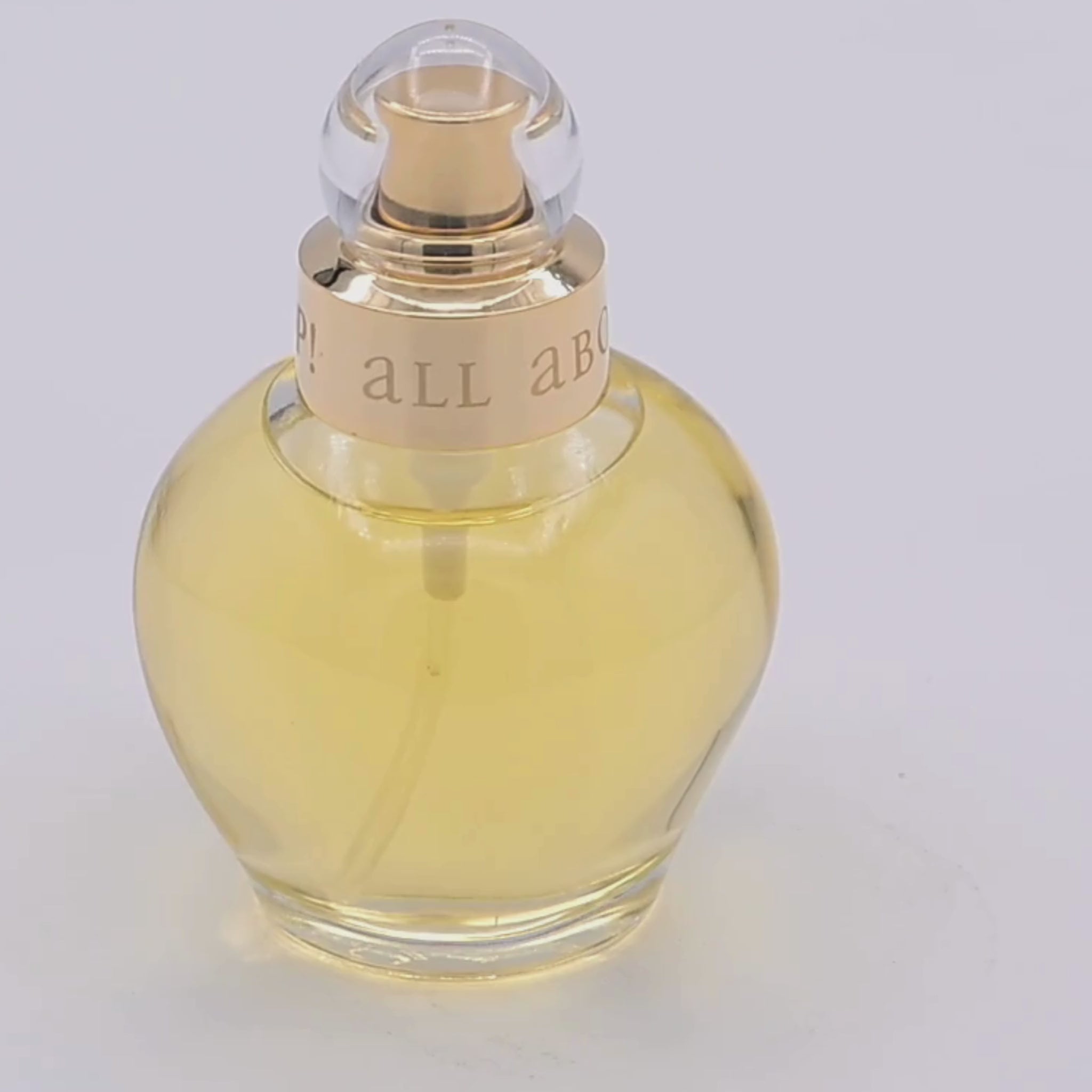 Joop! perfume bottle rotating on a white podium