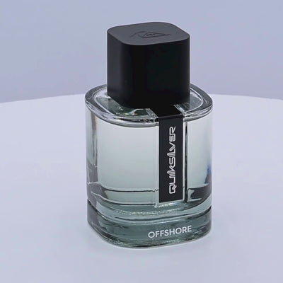 Quiksilver offshore perfume bottle rotating on a white podium