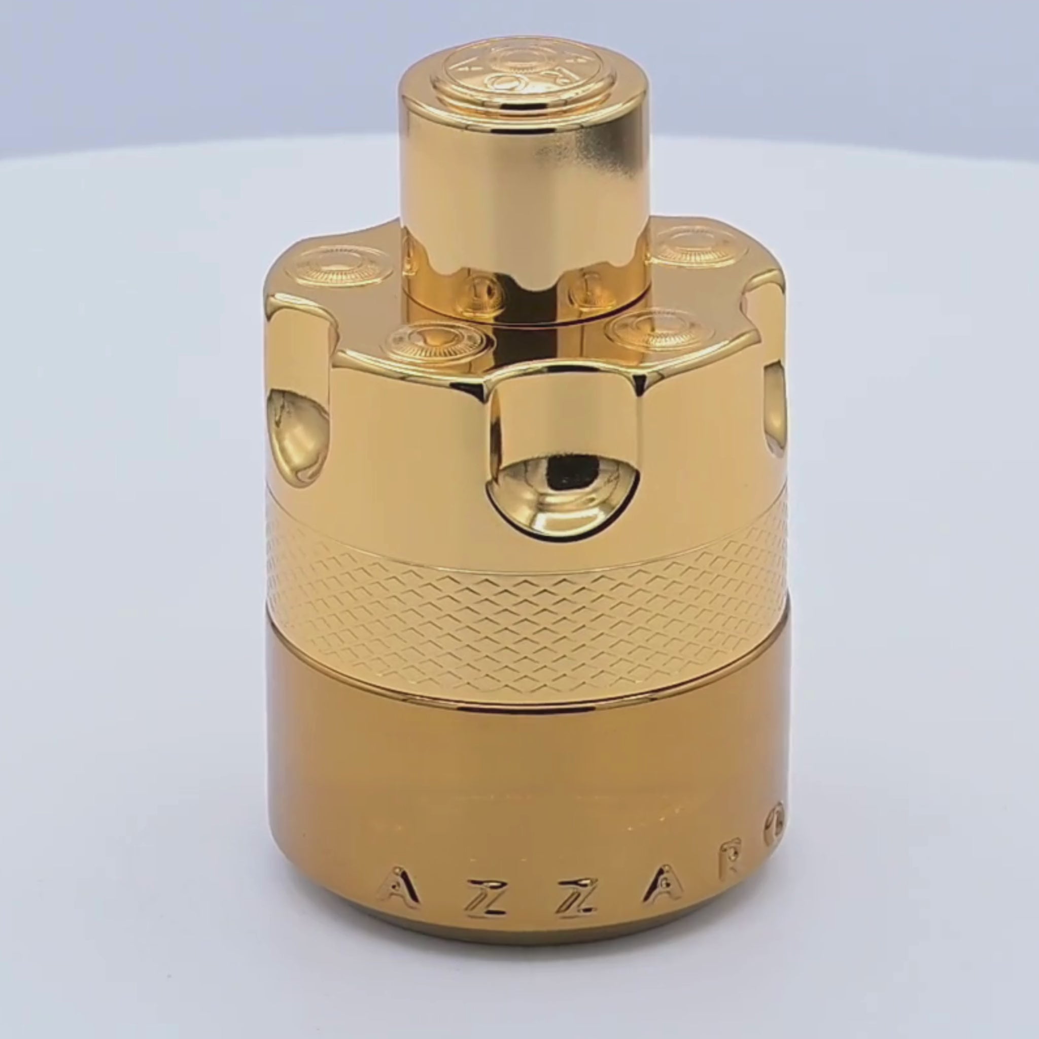 Azzaro Forever Wanted perfume bottle rotating on a white podium