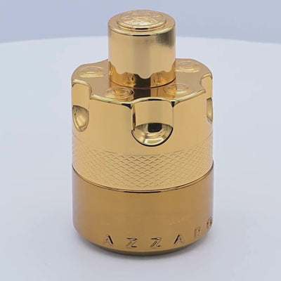 Azzaro Forever Wanted perfume bottle rotating on a white podium