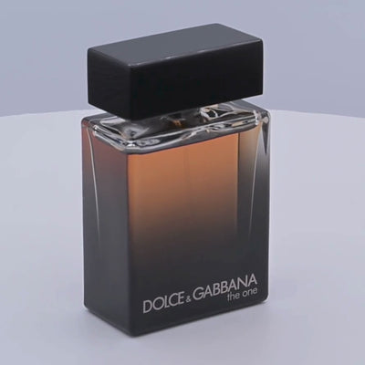 Dolce & Gabbana perfume bottle rotating on a white podium