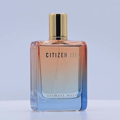 Perfume bottle  with 'Citizen Jill' branding rotating on a white podium