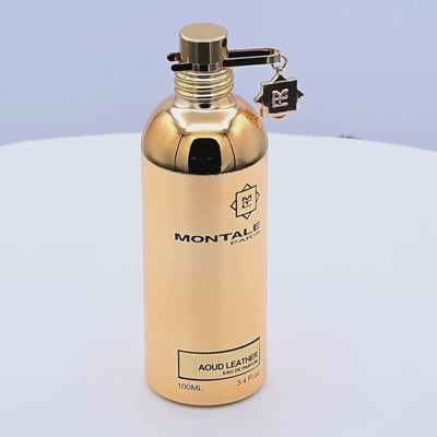 Gold perfume bottle with Montale Paris logo rotating on a white podium